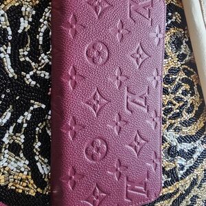 Louis Vuitton Plum Embossed Monogram Zippy Wallet